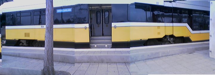Raised platform panorama showing stepped entry at raised section, approximate location of entry doors and degree of barrier of curb.