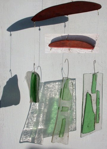 Windchime with fused glass elements and cherry wood hanger.