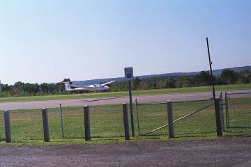 Corning soaring hill - plane flying above runway