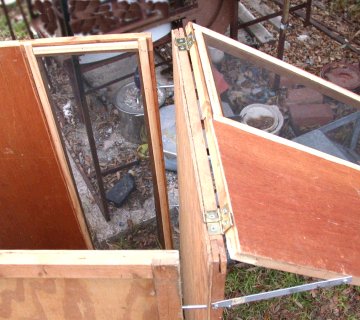 Door to slide up in end of Cat House, trapped to keep with end panel