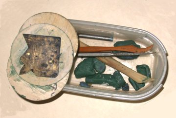 Clay tools and Tupperware carrier