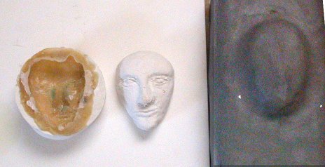 Mold of face in latex and pressed into clay mold side