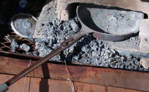 Cast iron fry pan used to melt aluminum