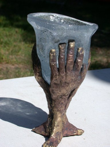 Cast brass goblet base and first blown glass