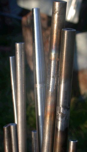 Newly welded stainless steel pipe and punty 5/8" dia.