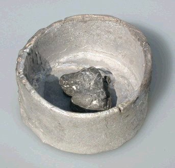 Mold cup cast of alumium with dog head insert