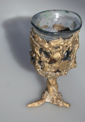 Goblet with glass blow into it and lip worked.