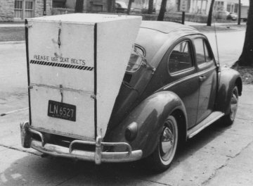 VW Beetle with wooden camping box over engine compartment