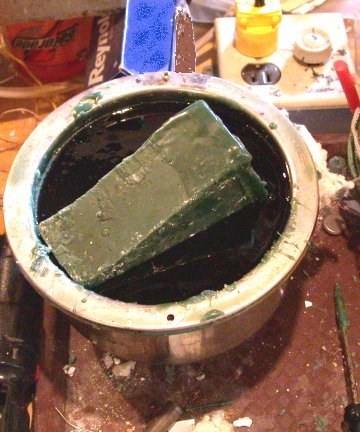 Wax melting pot using old popcorn popper pot.